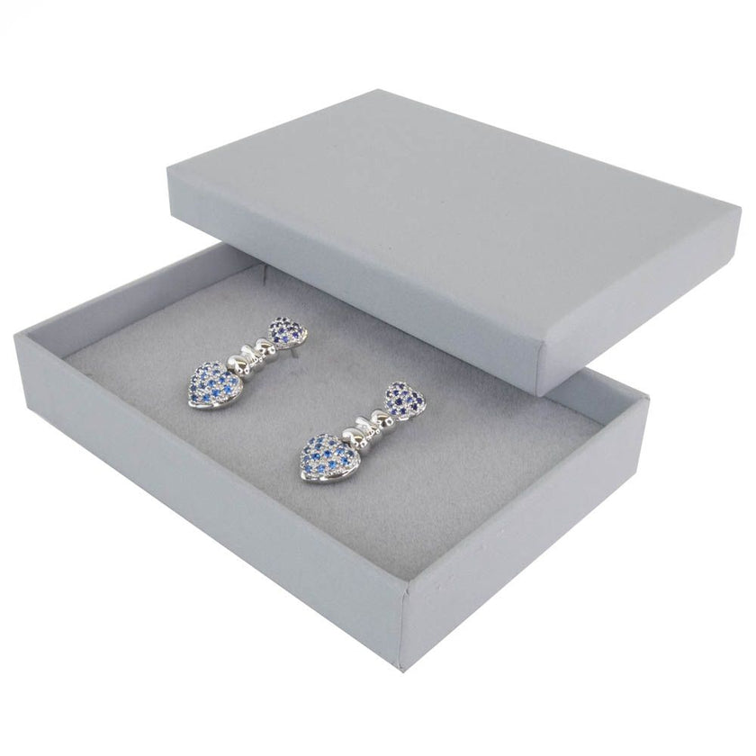 Grey rectangle recyclable eco kraft box with earrings.