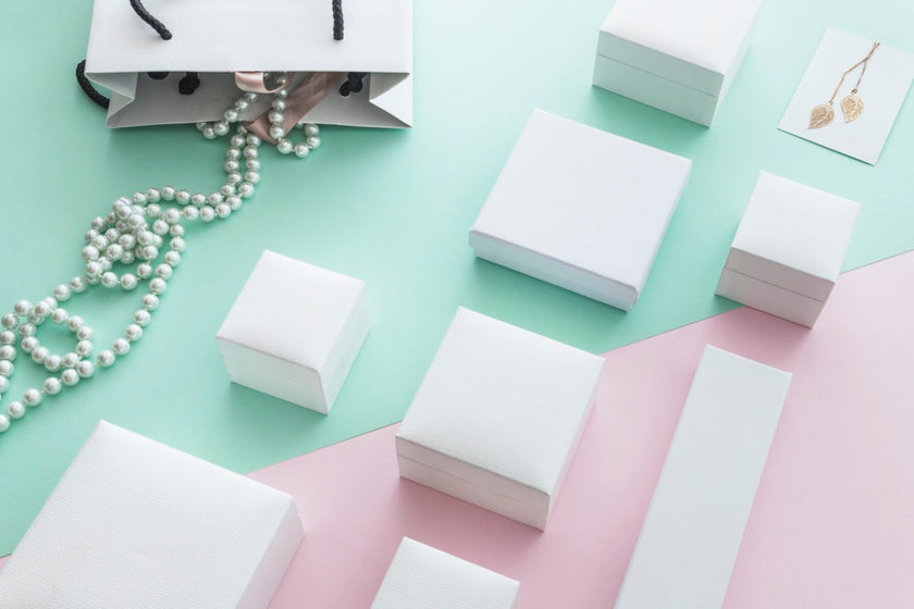 white tulip ring box with hot foil branding