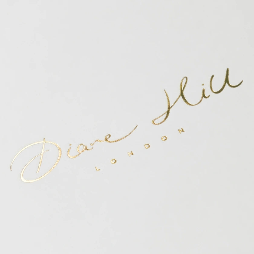 Elegant gold cursive text reads 