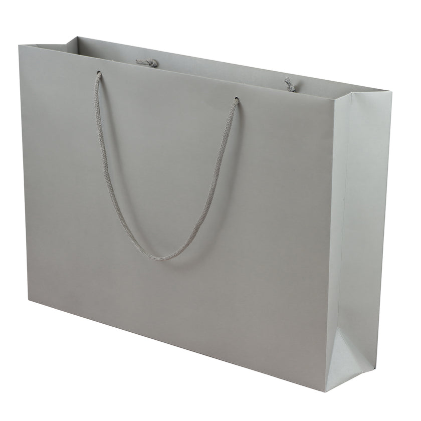 Grey eco-friendly paper gift bag with braided rope handles.