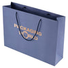 Blue paper bag with 'Packaging World' text and logo on a white background
