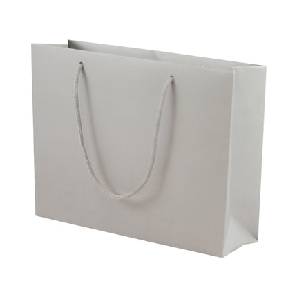 Grey eco-friendly paper gift bag with braided rope handles.