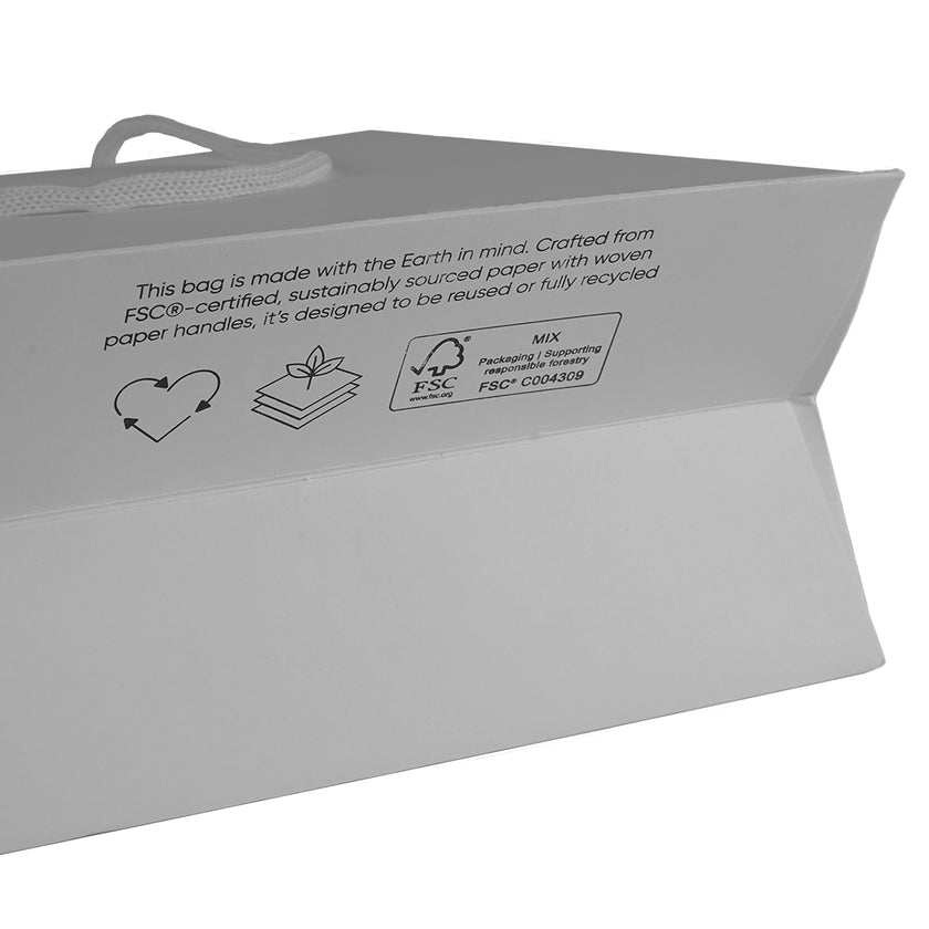 Grey eco-friendly paper gift bag with a FSC Certified logo.