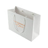 White paper bag with 'Packaging World' logo on a white background