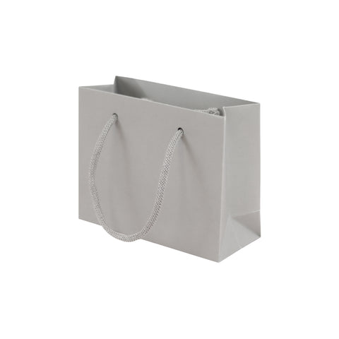 Grey eco-friendly paper gift bag with braided rope handles.