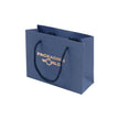 Blue paper gift bag with 'Packaging World' text on a white background