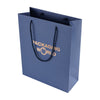 Blue paper bag with 'Packaging World' text on a white background