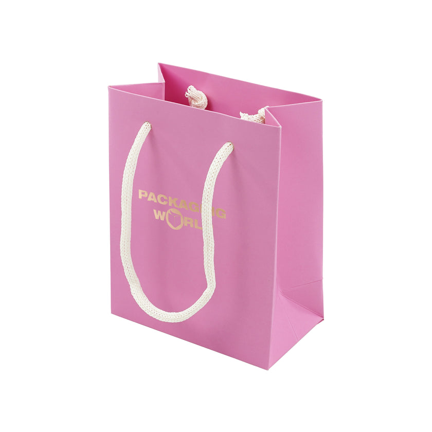 Pink paper bag with white handles and 'Packaging World' branding on a white background