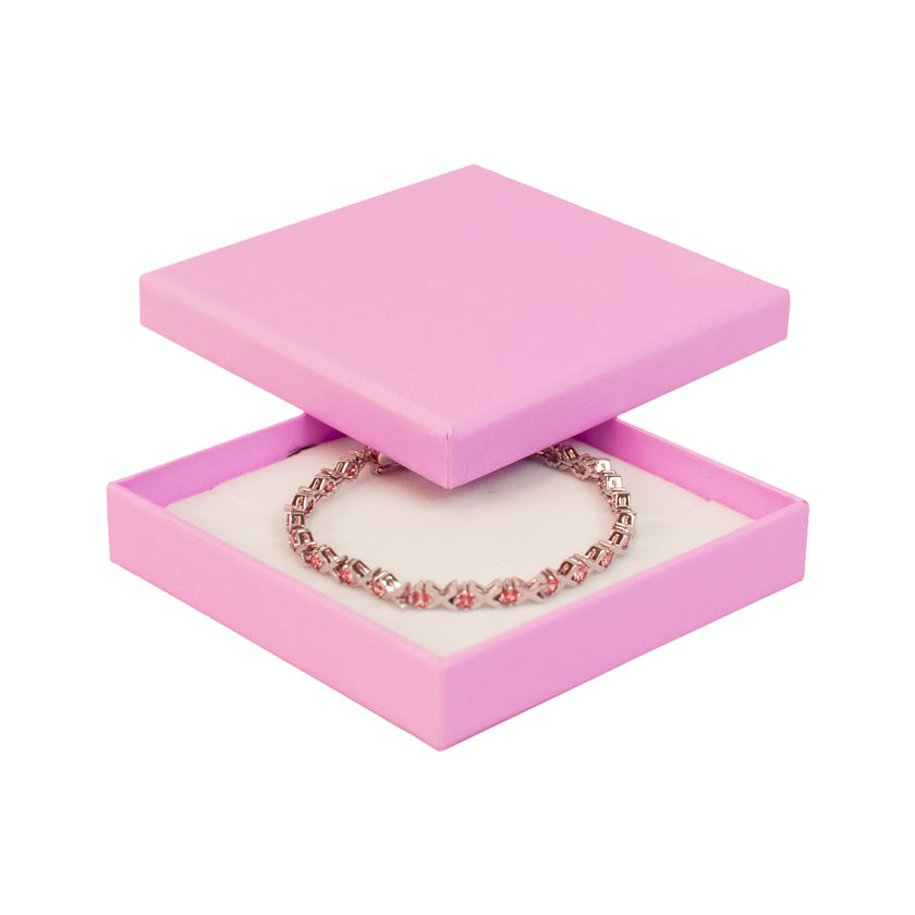 Pink square recyclable eco kraft box with jewellery item.
