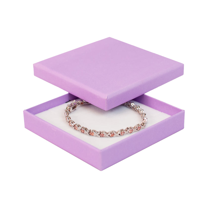 Lilac square recyclable eco kraft box with jewellery item.