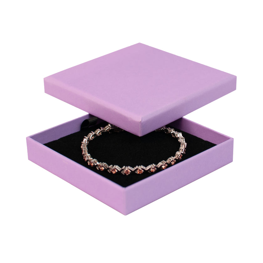 Lilac square recyclable eco kraft box with jewellery item.